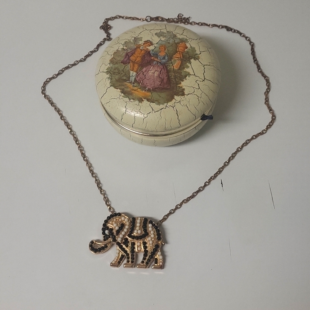 Pearled/beaded Elepant pendant in black and cream color and gold  tone Necklace